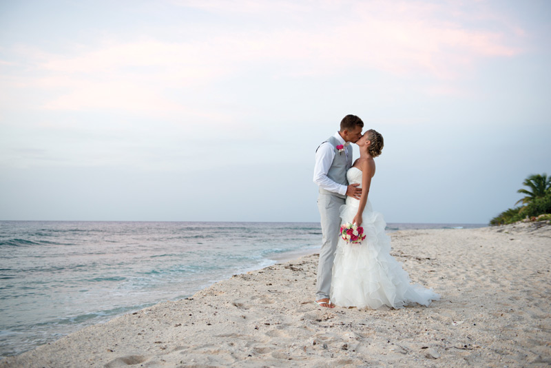 Couple kissing on beach 