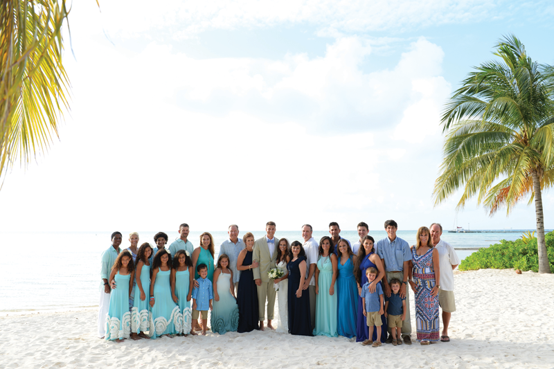 Wedding couple with guests